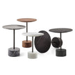 The 9 Occasional Table by Cassina features a modular cylindrical design by Piero Lissoni, offering refined versatility for residential and contract interiors.