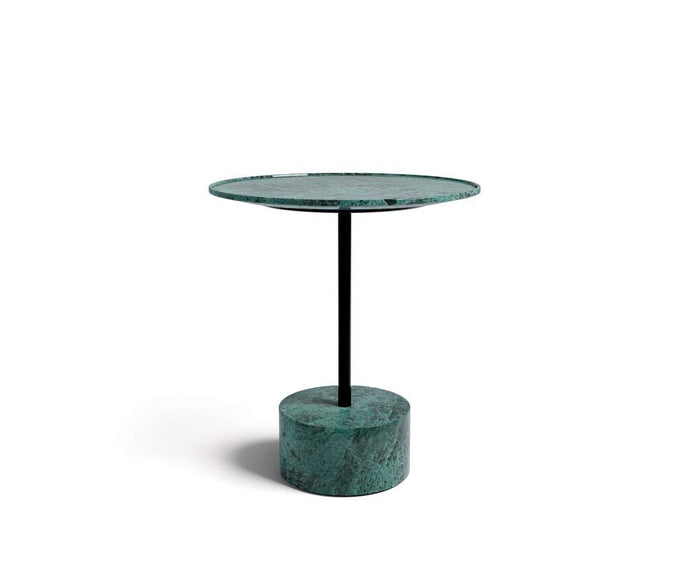 The 9 Occasional Table by Cassina features a modular cylindrical design by Piero Lissoni, offering refined versatility for residential and contract interiors.