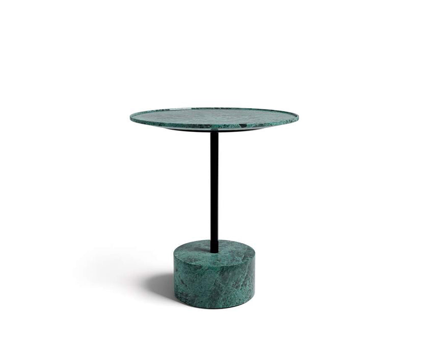 The 9 Occasional Table by Cassina features a modular cylindrical design by Piero Lissoni, offering refined versatility for residential and contract interiors.