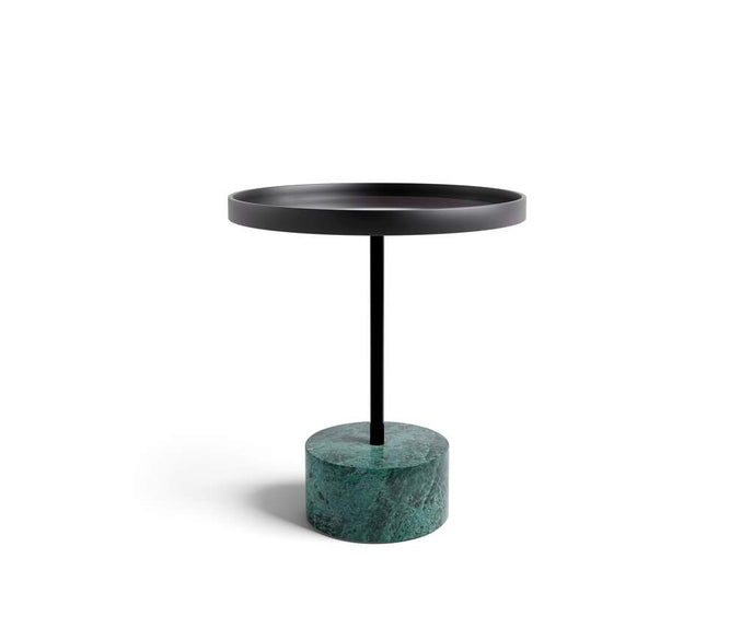 The 9 Occasional Table by Cassina features a modular cylindrical design by Piero Lissoni, offering refined versatility for residential and contract interiors.
