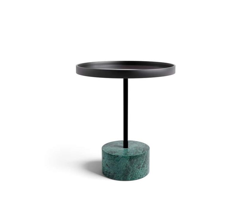 The 9 Occasional Table by Cassina features a modular cylindrical design by Piero Lissoni, offering refined versatility for residential and contract interiors.
