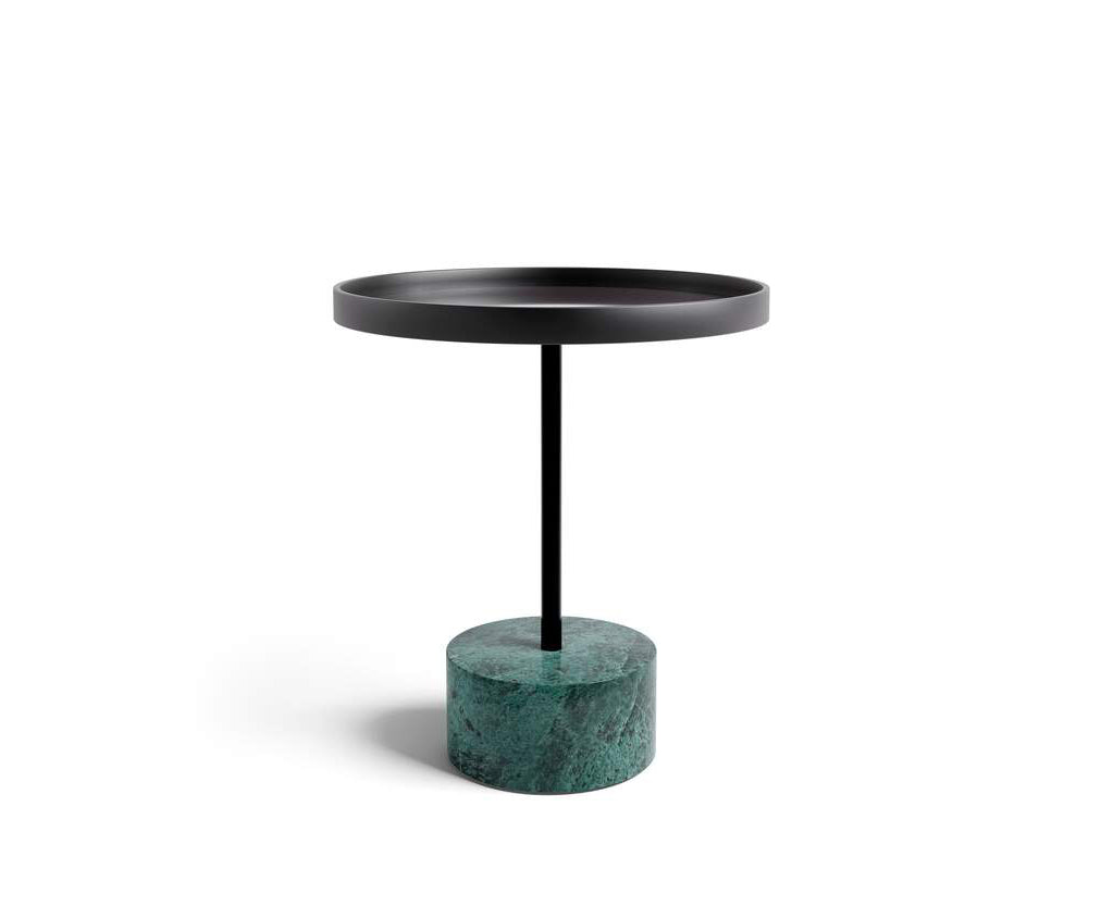 The 9 Occasional Table by Cassina features a modular cylindrical design by Piero Lissoni, offering refined versatility for residential and contract interiors.