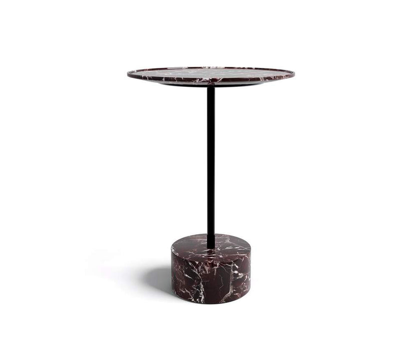 The 9 Occasional Table by Cassina features a modular cylindrical design by Piero Lissoni, offering refined versatility for residential and contract interiors.