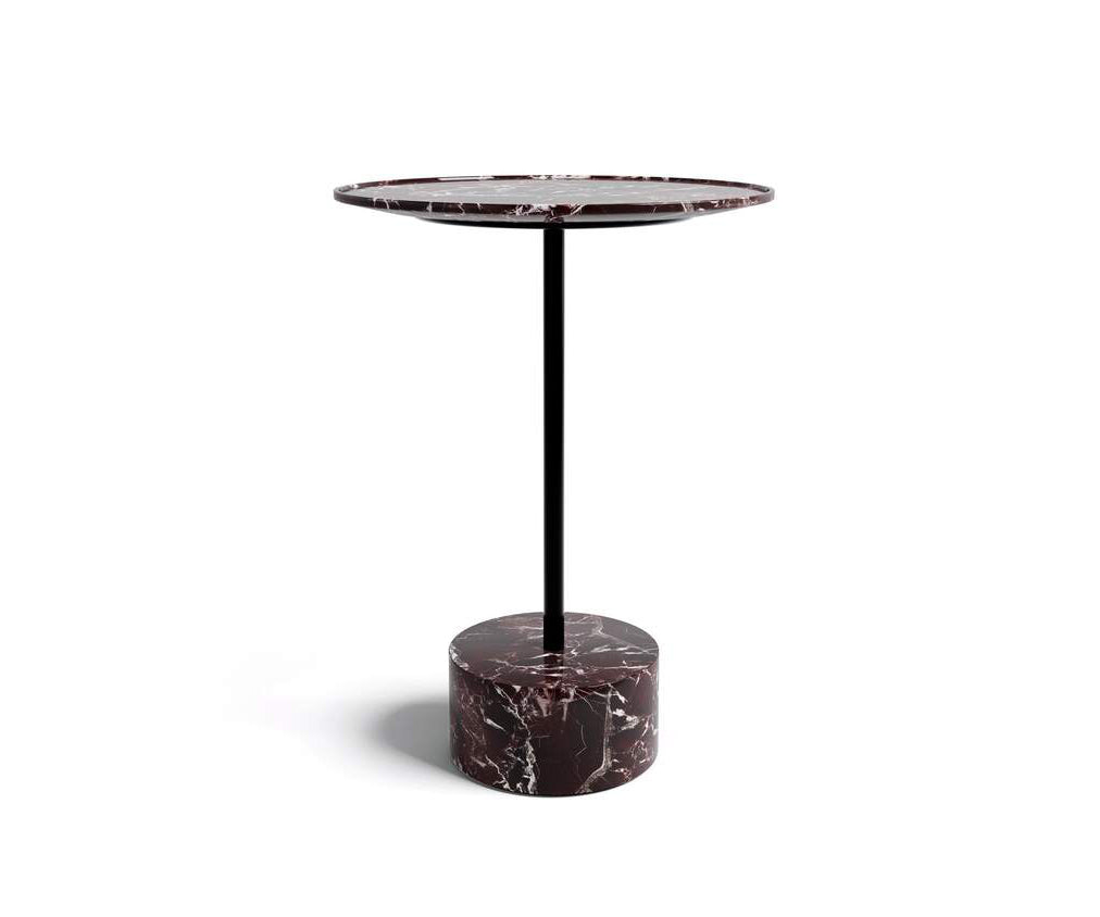 The 9 Occasional Table by Cassina features a modular cylindrical design by Piero Lissoni, offering refined versatility for residential and contract interiors.