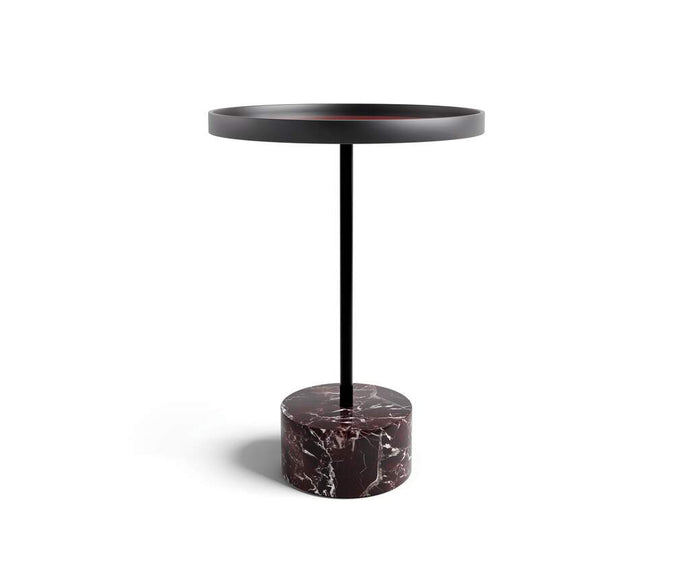The 9 Occasional Table by Cassina features a modular cylindrical design by Piero Lissoni, offering refined versatility for residential and contract interiors.