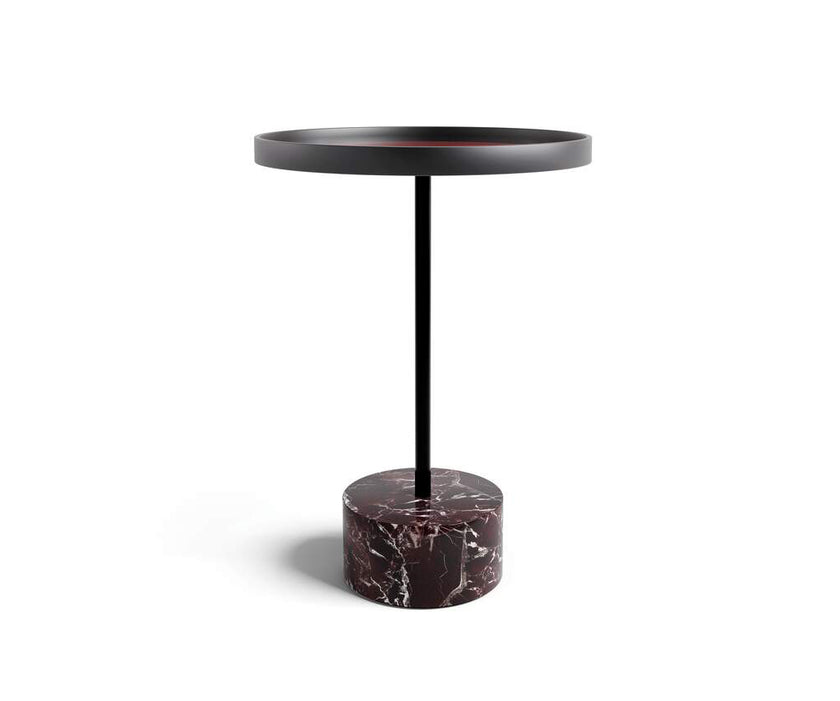 The 9 Occasional Table by Cassina features a modular cylindrical design by Piero Lissoni, offering refined versatility for residential and contract interiors.