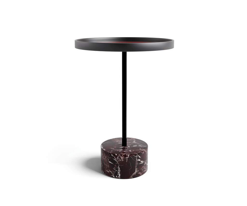 The 9 Occasional Table by Cassina features a modular cylindrical design by Piero Lissoni, offering refined versatility for residential and contract interiors.