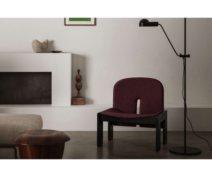 925 Upholstered Lounge Chair by Cassina with an upholstered seat and solid ash wood frame.