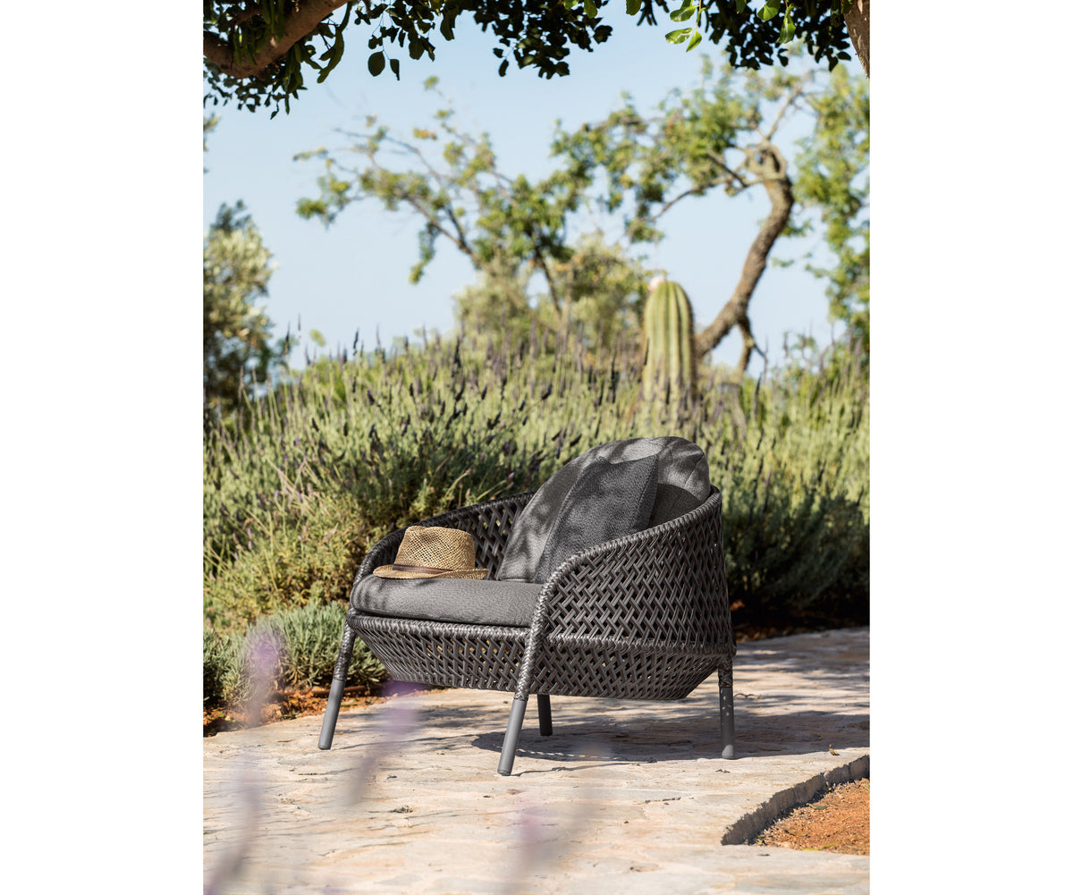 Luxury Ahnda Lounge Chair by Dedon with Open Weave Design | Casa Design Group
