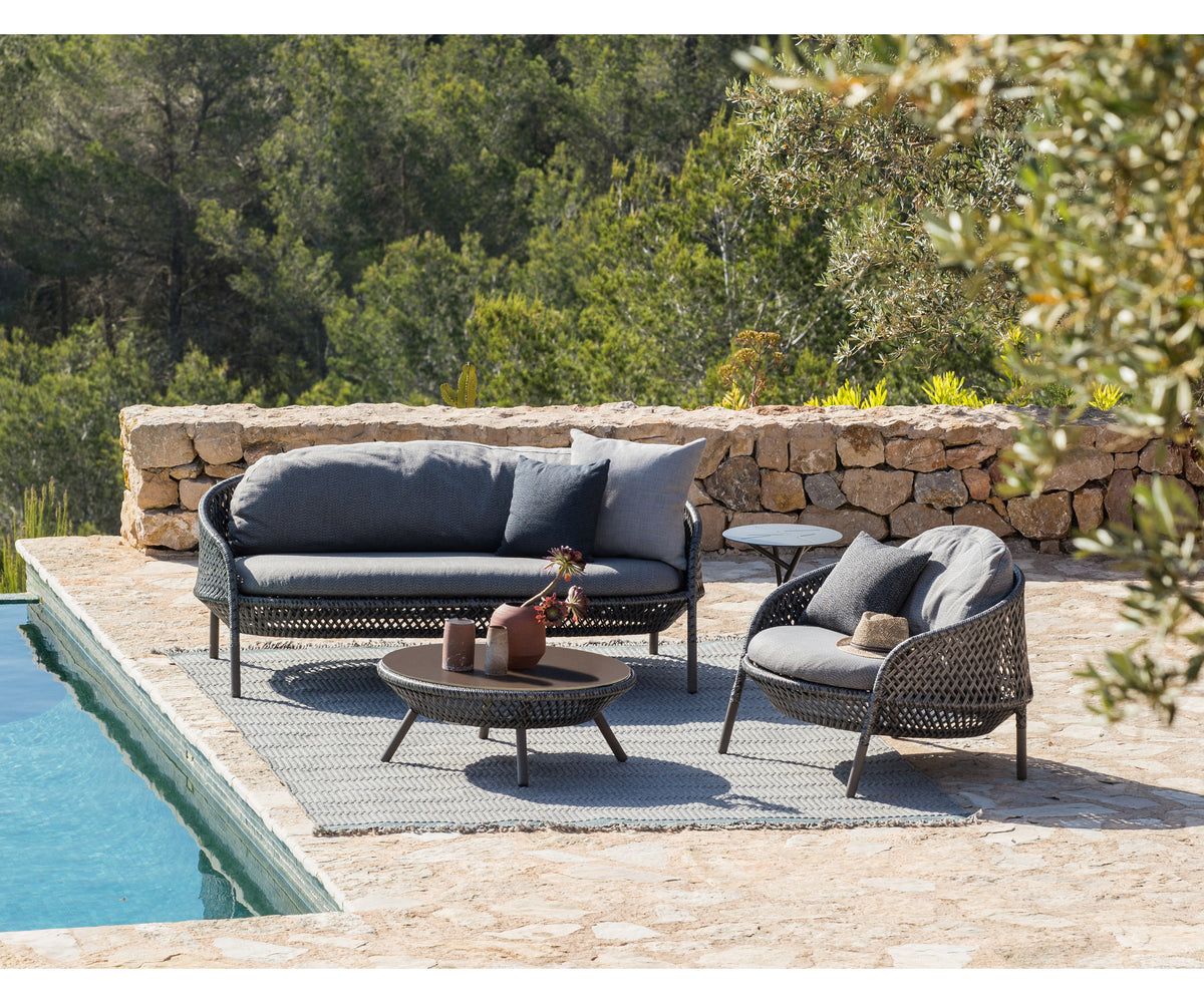 Luxury Ahnda Lounge Chair by Dedon with Open Weave Design | Casa Design Group