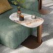 Amalfi C-Table with sculptural steel base, curved metal column and organic ceramic top by Cattelan Italia | Casa Design Group
