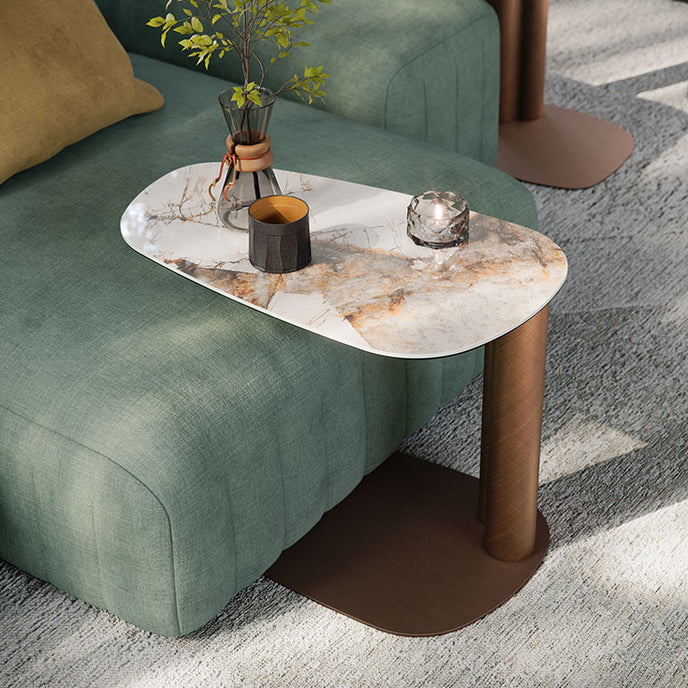 Amalfi C-Table with sculptural steel base, curved metal column and organic ceramic top by Cattelan Italia | Casa Design Group