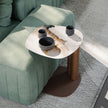 Amalfi C-Table with sculptural steel base, curved metal column and organic ceramic top by Cattelan Italia | Casa Design Group