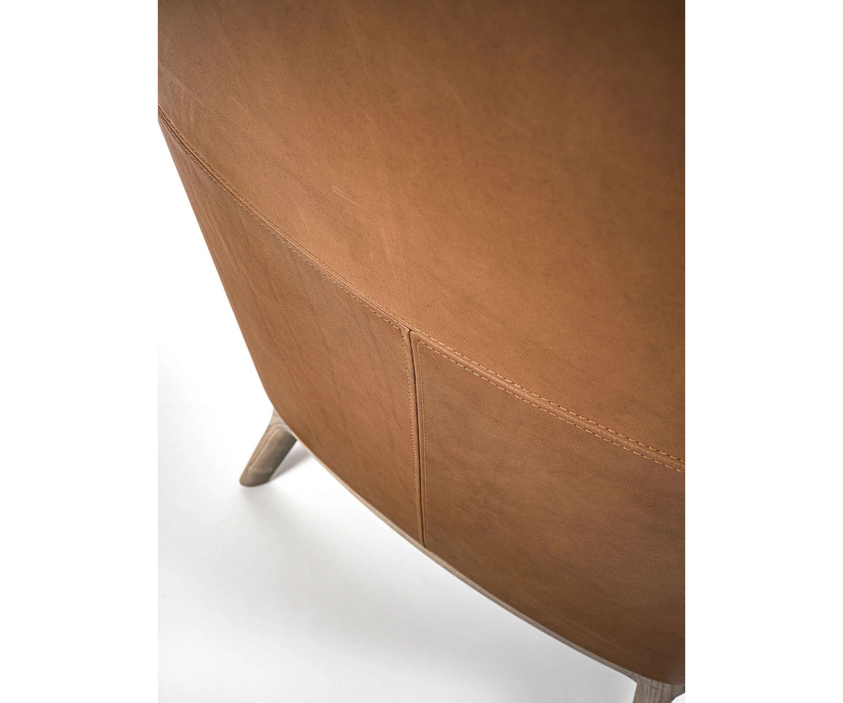 Amanda Bergère by Frigerio upholstered lounge chair with solid wood base Casa Design Group
