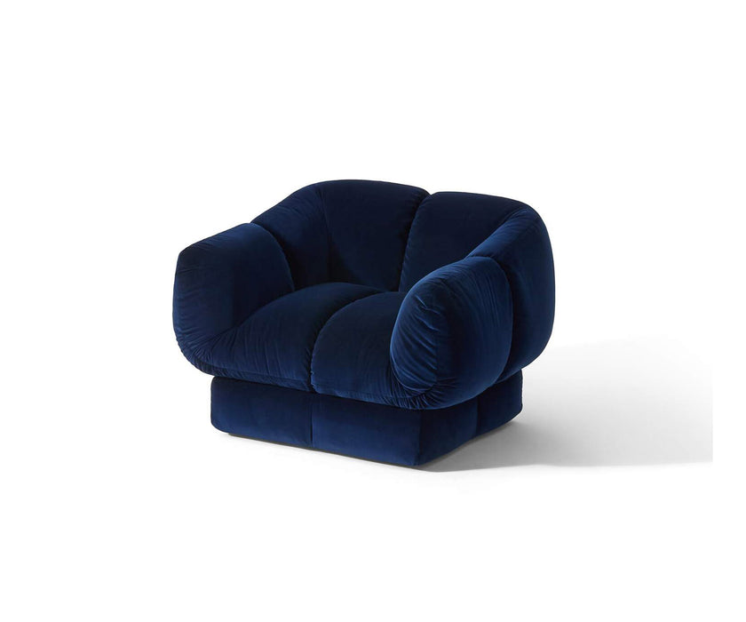 Ardys Lounge Chair by Cassina with deep stitched upholstery and a sculptural contemporary design.