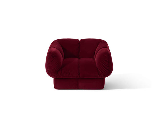 Ardys Lounge Chair by Cassina with deep stitched upholstery and a sculptural contemporary design.