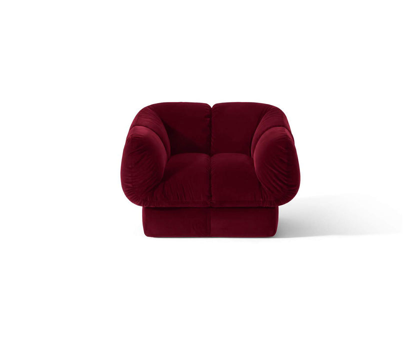 Ardys Lounge Chair by Cassina with deep stitched upholstery and a sculptural contemporary design.