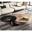 Arena Coffee Table by Cattelan Italia with a hand-brushed wood top and rotating glass extensions.