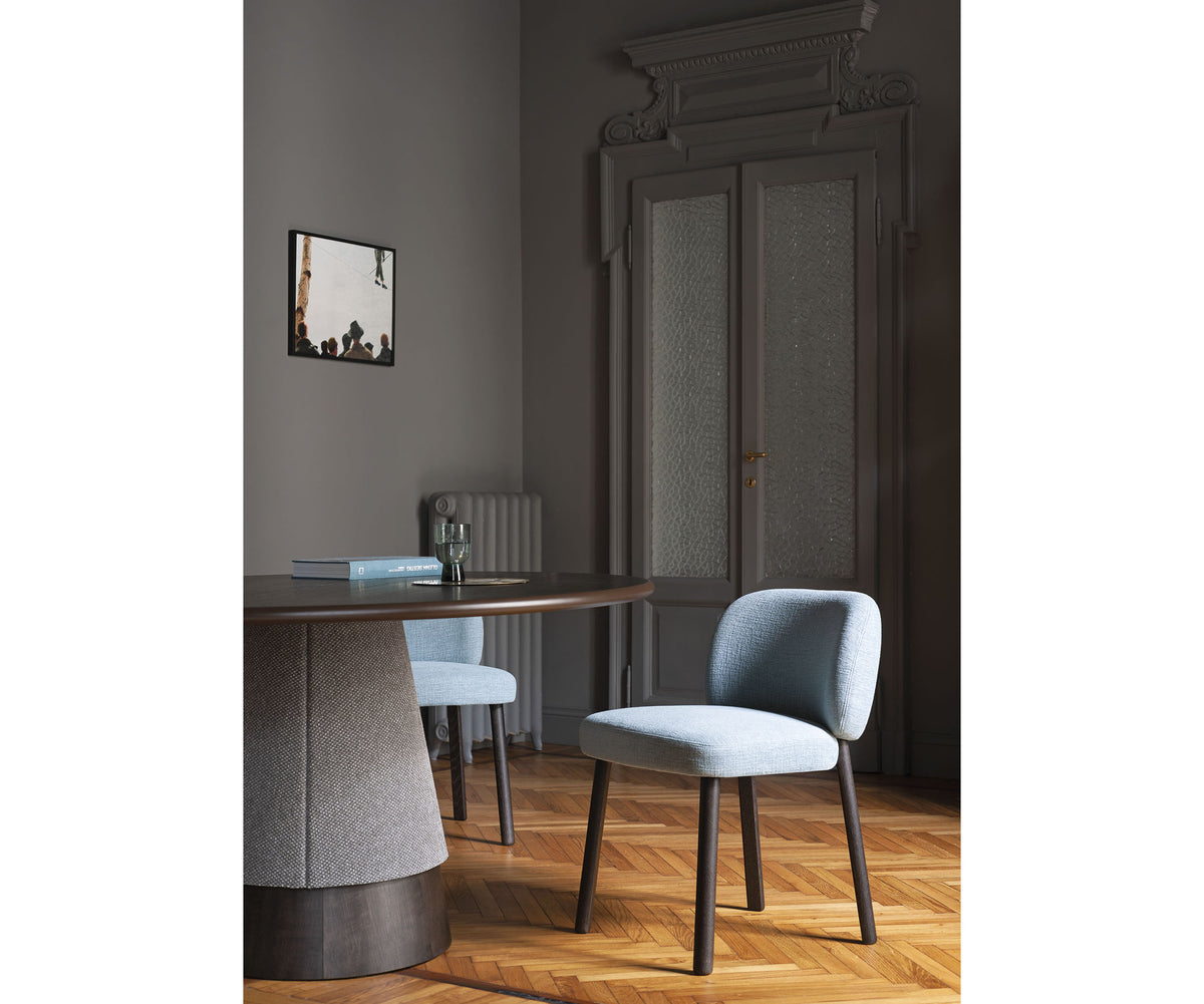 Aretha 3400 table by Bross with central column base in stone or ashwood and ceramic or wood top Casa Design Group