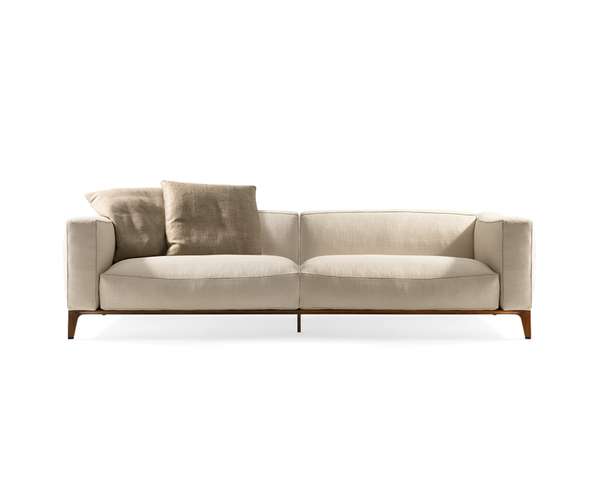 Aton Sofa by Giorgetti modular Italian sofa with Canaletto walnut structure and premium upholstery | Casa Design Group