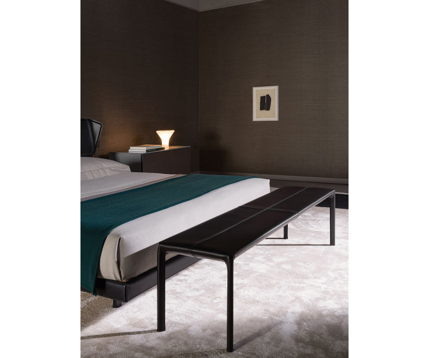 Azul Bench by Molteni&C upholstered in regenerated hide leather with a powder-coated steel frame.