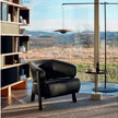 Back-Wing Lounge Chair by Cassina designed by Patricia Urquiola with a solid wood frame and upholstered seat.