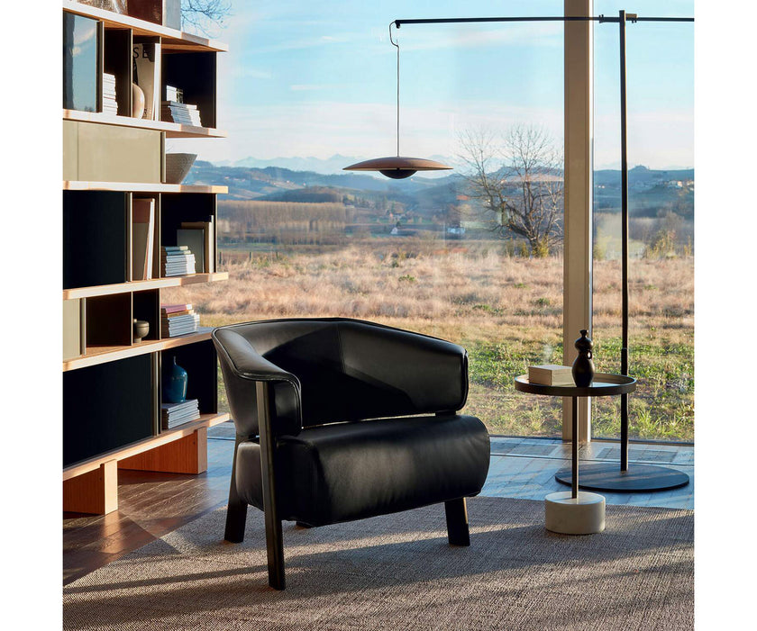 Back-Wing Lounge Chair by Cassina designed by Patricia Urquiola with a solid wood frame and upholstered seat.