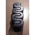 Baxter Adel leather bench with sculptural curved design.