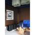 Baxter Adel leather pouf with sculptural curved design.