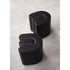 Baxter Adel leather pouf with sculptural curved design.