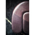 Baxter Adel leather pouf with sculptural curved design.