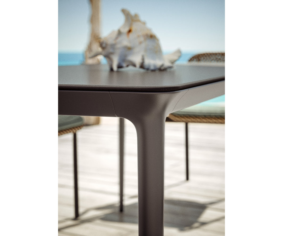 Contemporary Dedon Bellmonde Dining Table M for Elegant Outdoor Spaces | Casa Design Group