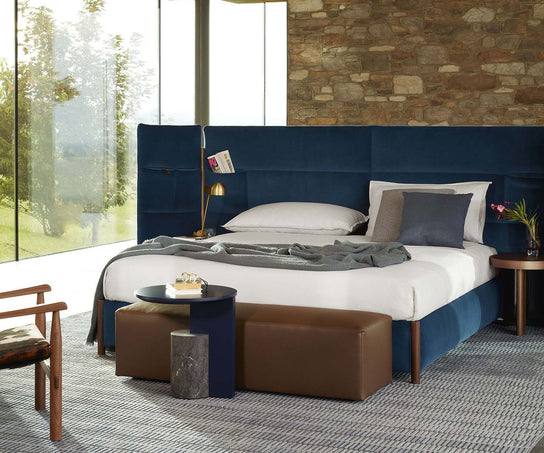 Bio-mbo bed by Cassina with upholstered headboard, storage pockets and modern design – Casa Design Group