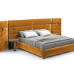 Bio-mbo bed by Cassina with upholstered headboard, storage pockets and modern design – Casa Design Group
