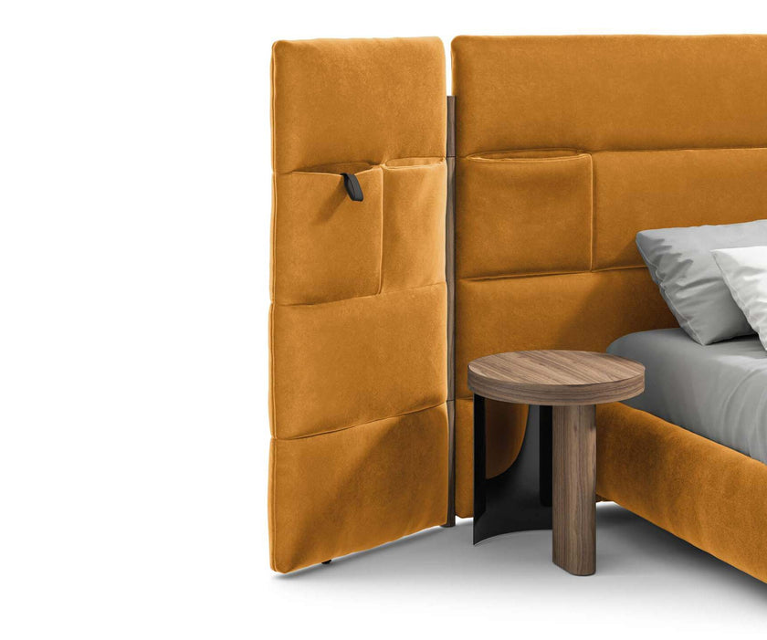Bio-mbo bed by Cassina with upholstered headboard, storage pockets and modern design – Casa Design Group