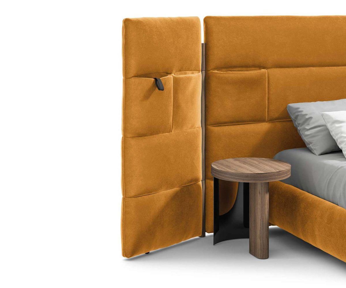 Bio-mbo bed by Cassina with upholstered headboard, storage pockets and modern design – Casa Design Group