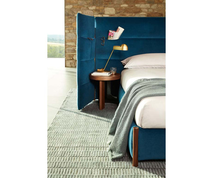 Bio-mbo bed by Cassina with upholstered headboard, storage pockets and modern design – Casa Design Group