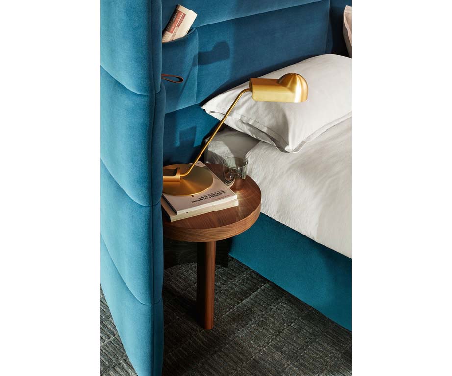 Bio-mbo bed by Cassina with upholstered headboard, storage pockets and modern design – Casa Design Group