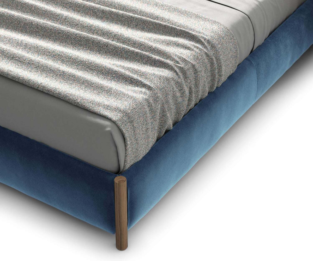 Bio-mbo bed by Cassina with upholstered headboard, storage pockets and modern design – Casa Design Group