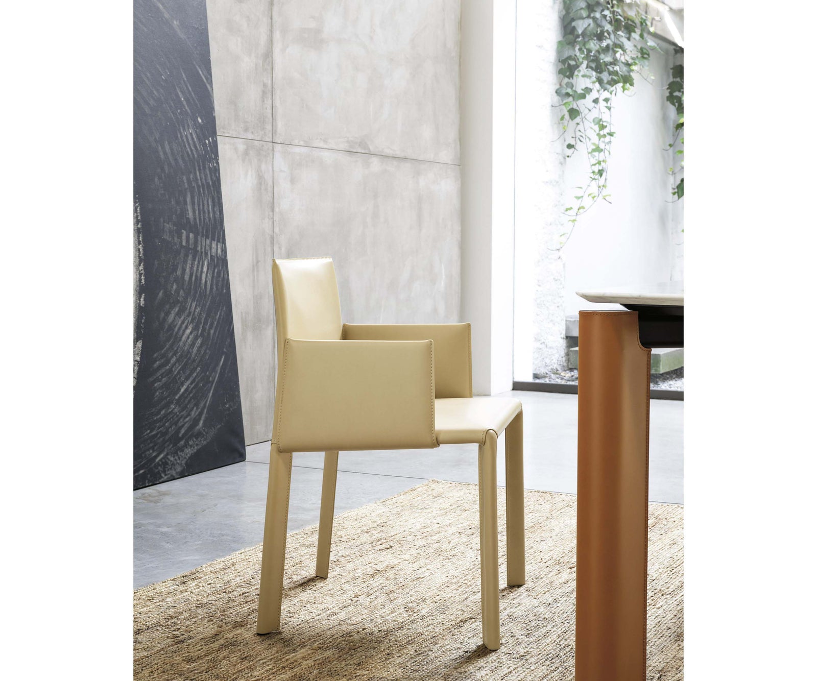 Blyn P dining armchair by Frag upholstered in saddle leather with clean contemporary design – Casa Design Group