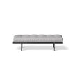 Bonaldo James upholstered bedroom bench with padded seat and painted metal base in a contemporary bedroom setting.