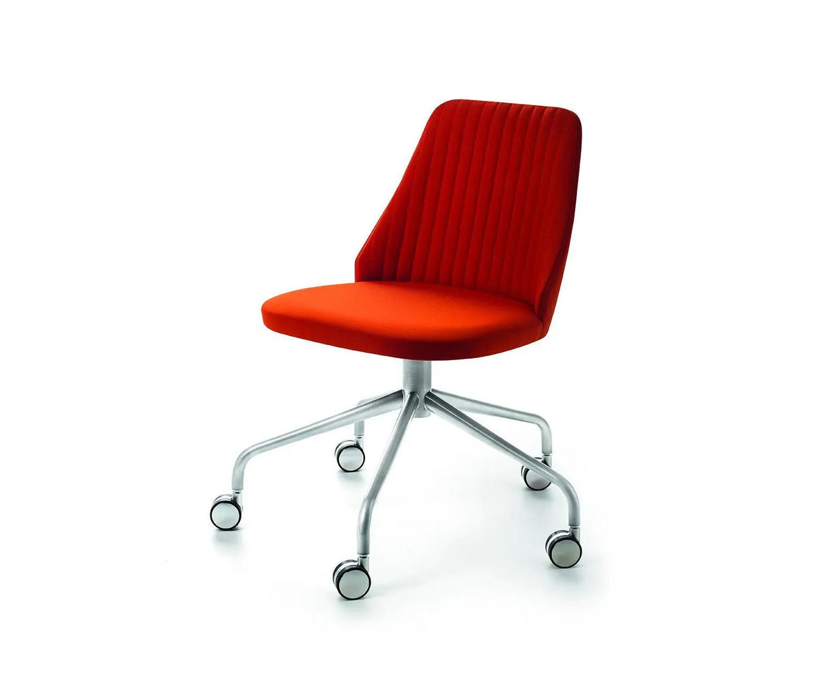 Break 1542 swivel chair by Bross with quilted upholstery and satin chromed base with casters Casa Design Group