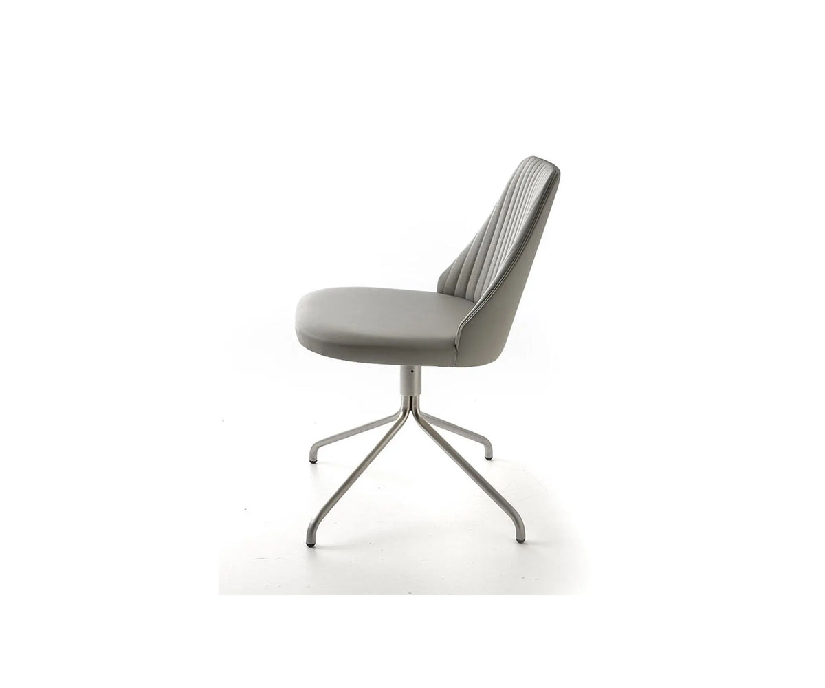Break 1642 swivel chair by Bross with quilted upholstery and satin chromed metal base Casa Design Group