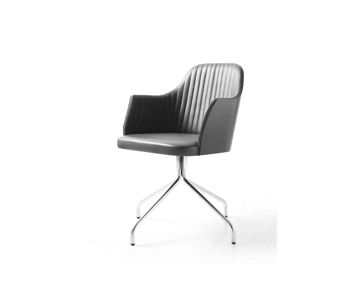 Break 1643 swivel armchair by Bross with quilted upholstery and satin chromed metal base Casa Design Group