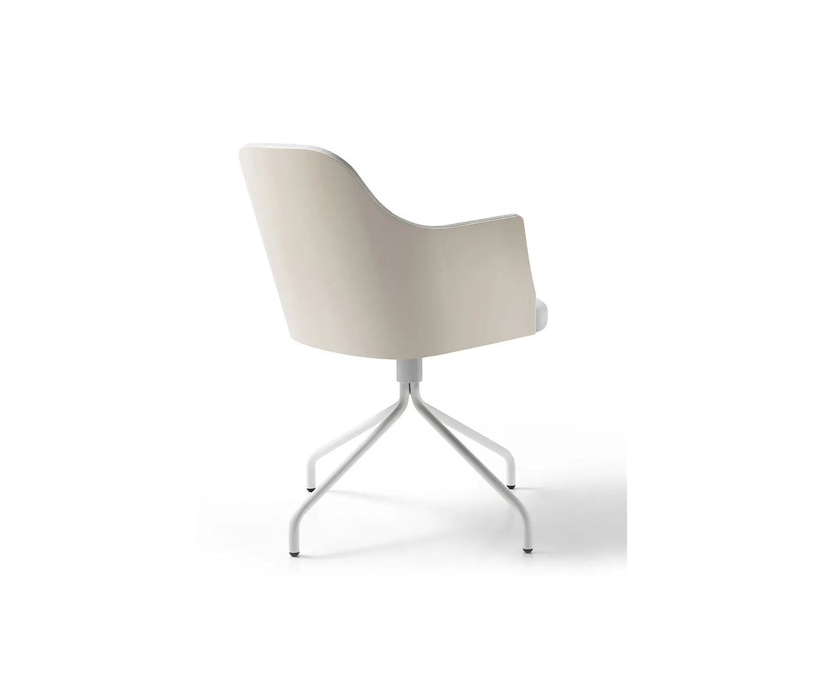 Break 1643 swivel armchair by Bross with quilted upholstery and satin chromed metal base Casa Design Group