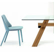 Break 1644 dining chair by Bross with quilted upholstery and beechwood legs Casa Design Group