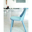 Break 1644 dining chair by Bross with quilted upholstery and beechwood legs Casa Design Group