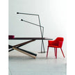 Break 1645 dining armchair by Bross with quilted upholstery and beechwood legs Casa Design Group