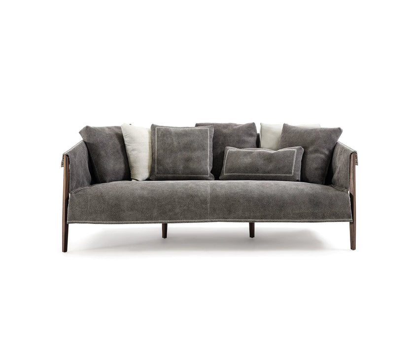 Burton Sofa by Frigerio featuring a solid ashwood frame, angled legs, and a sophisticated leather and fabric upholstery combination | Casa Design Group