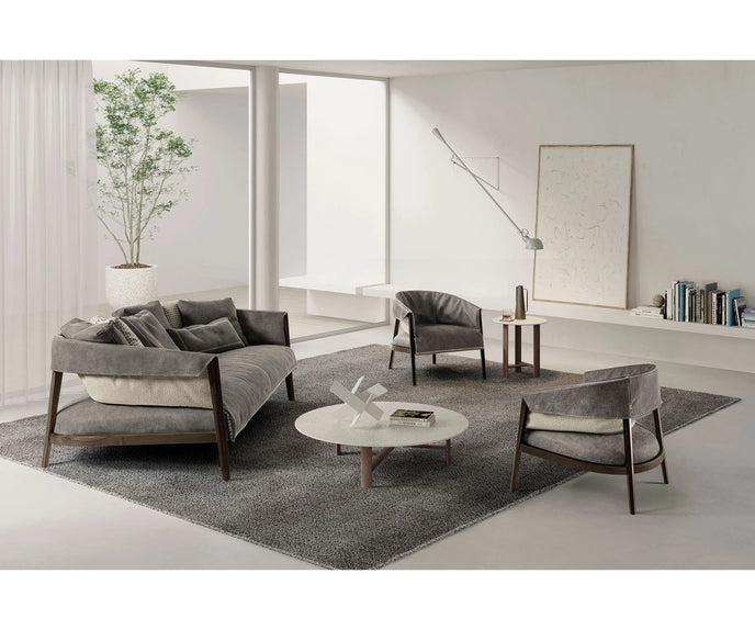 Burton Sofa by Frigerio featuring a solid ashwood frame, angled legs, and a sophisticated leather and fabric upholstery combination | Casa Design Group